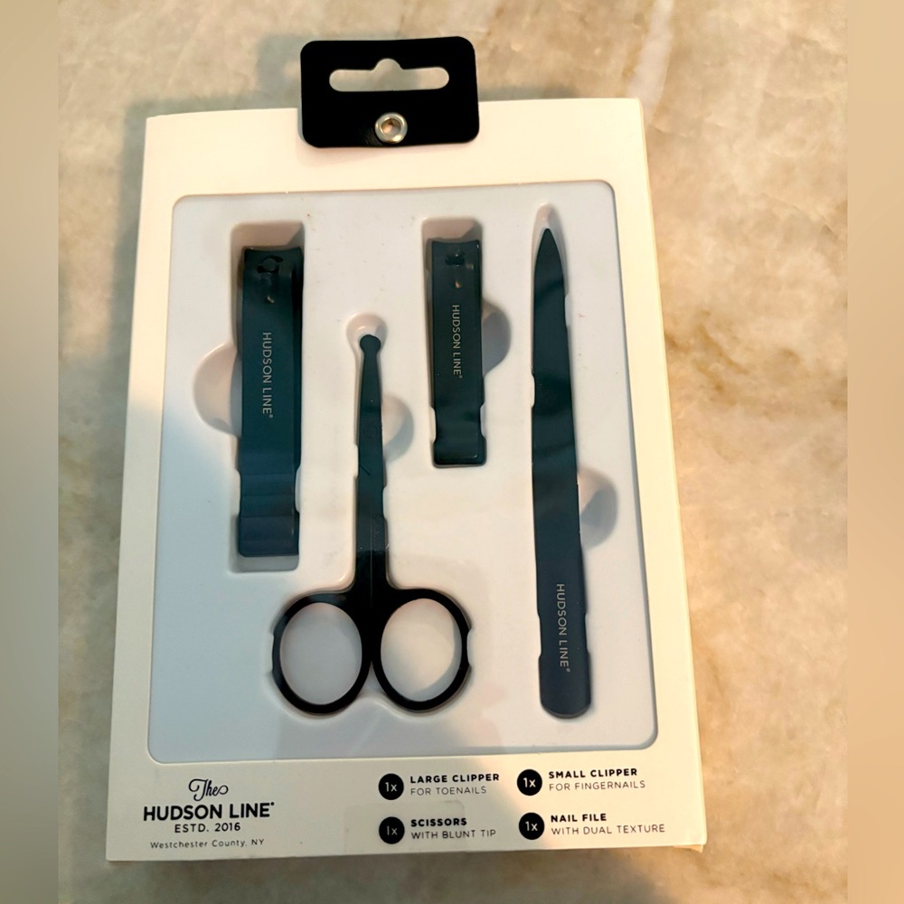 The Hudson Line 4 Piece Manicure Set. New in a sealed package. Black.